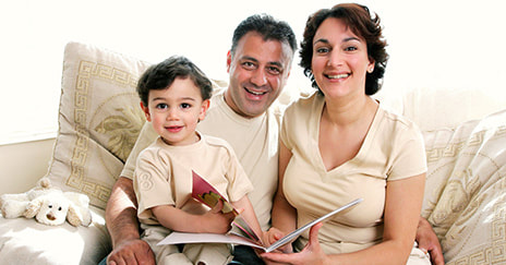 Hispanic family with their son